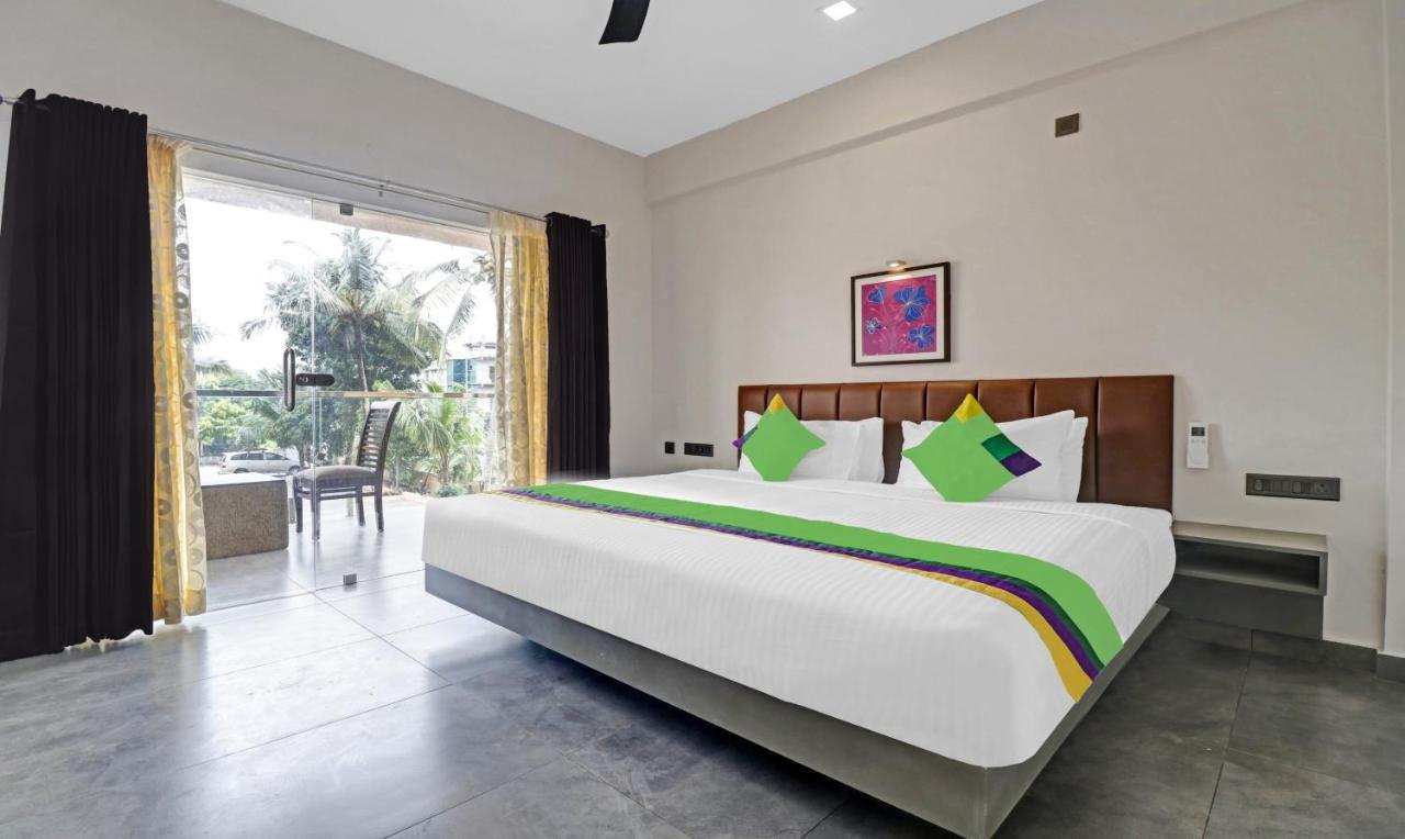 Treebo Grand Vistara Airport Suites Kochi Exterior foto